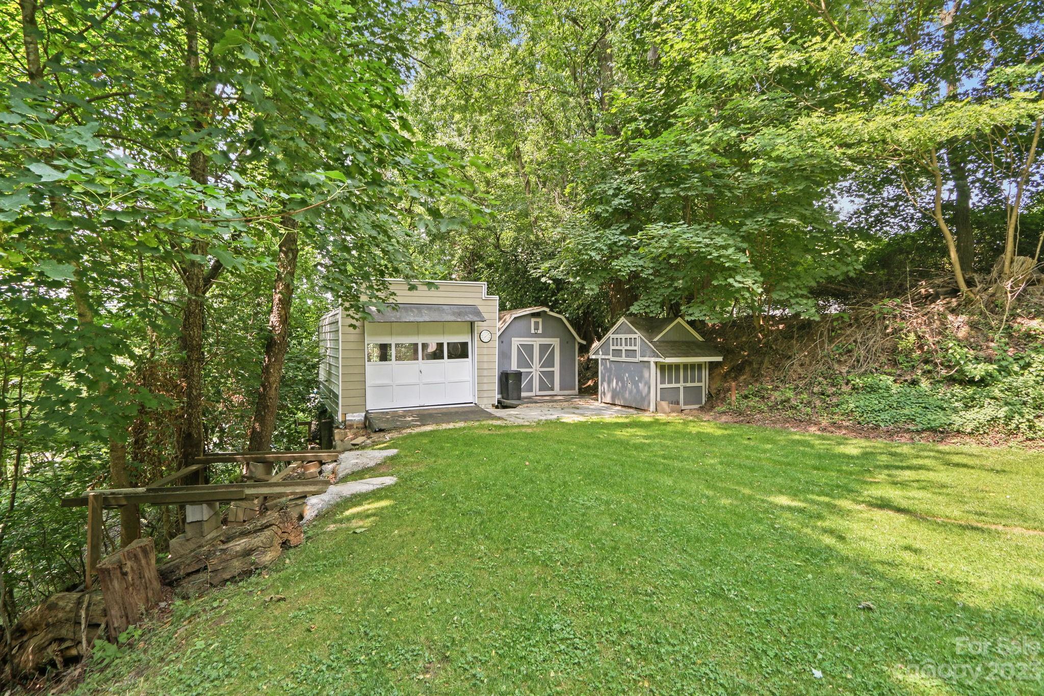 270 Pine Street Boone, NC 28607 - Photo 45 of 47 a front view of a house with a garden