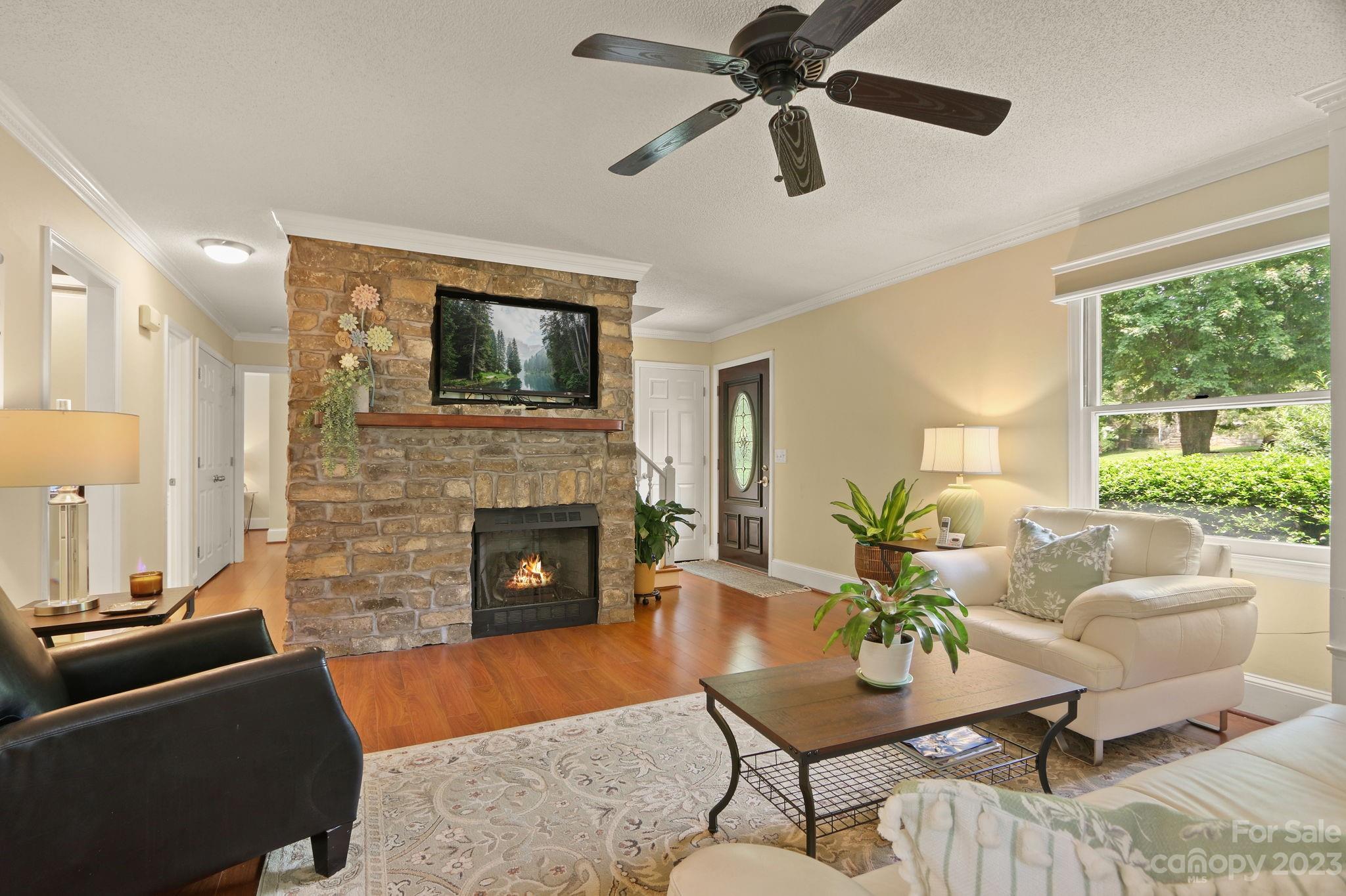 270 Pine Street Boone, NC 28607 - Photo 8 of 47 a living room with furniture and a fireplace