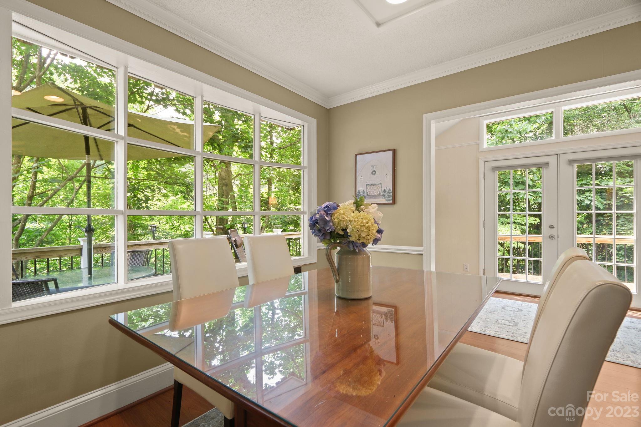 270 Pine Street Boone, NC 28607 - Photo 9 of 47 a view of a dining room with furniture window and outside view