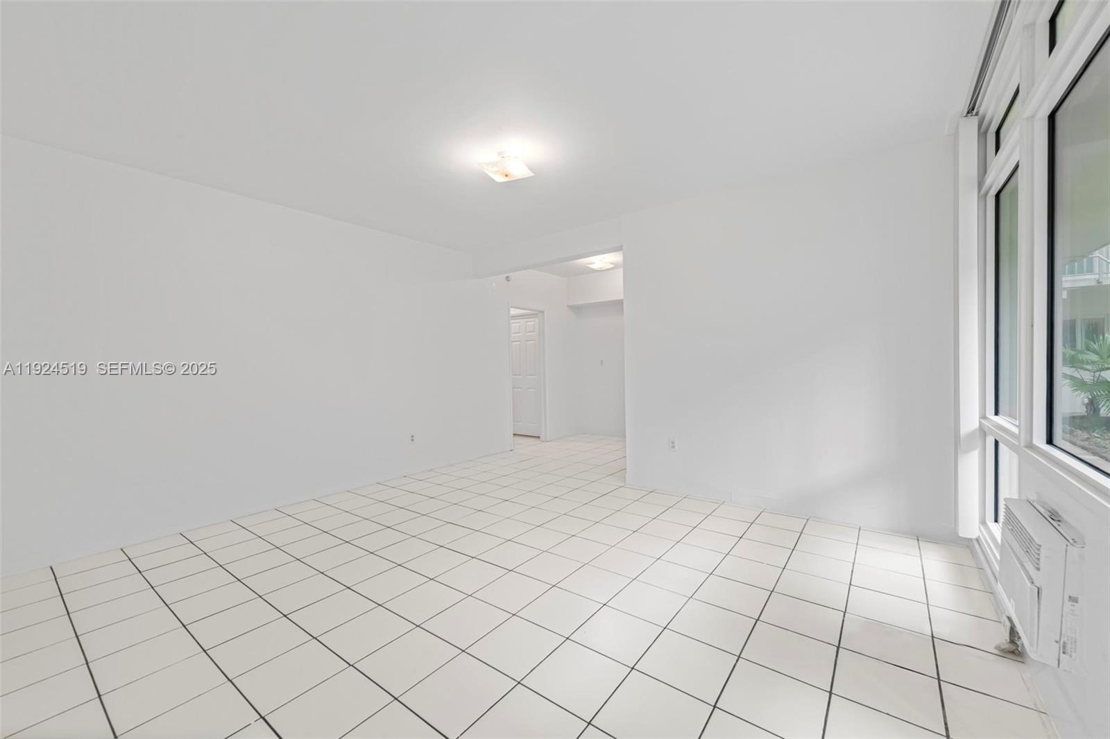 1850 Meridian Avenue, Unit 7 Miami Beach, FL 33139 - Photo 5 of 24 a view of an empty room
