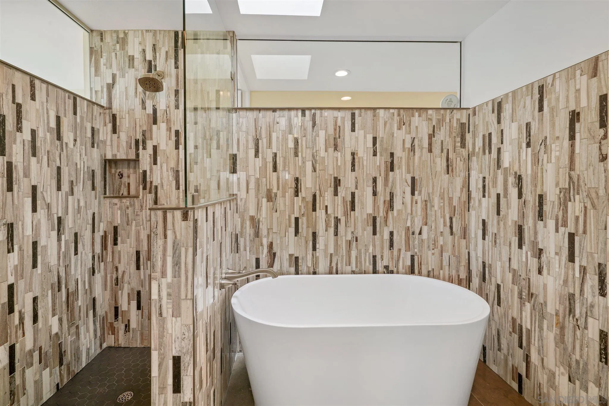 166 Solana Point Circle Solana Beach, CA 92075 - Photo 11 of 20 a white bath tub sitting under a large mirror