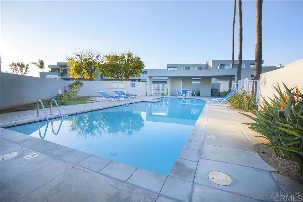 166 Solana Point Circle Solana Beach, CA 92075 - Photo 18 of 20 a view of a swimming pool with a lounge chairs