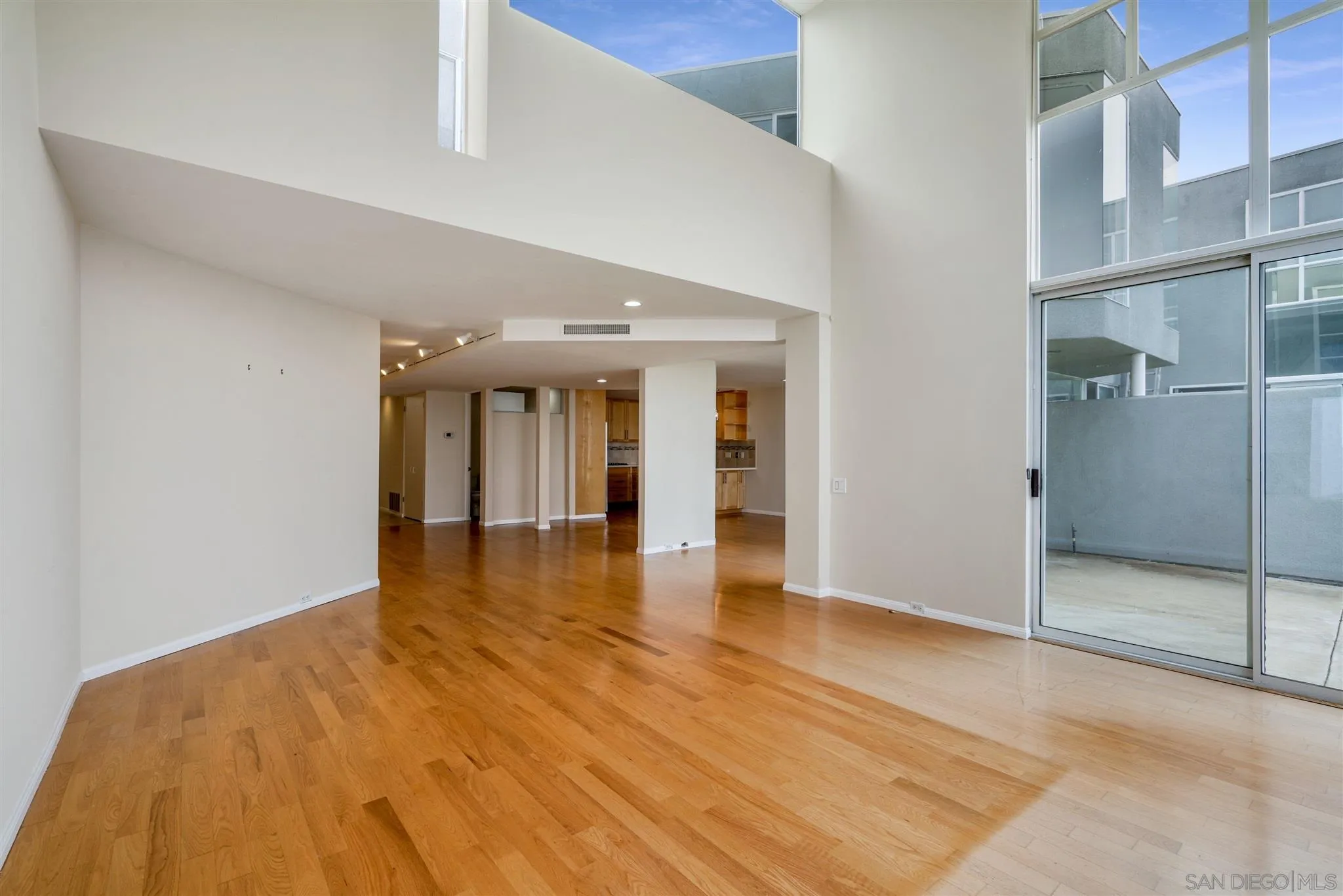 166 Solana Point Circle Solana Beach, CA 92075 - Photo 6 of 20 a view of an empty room with glass door