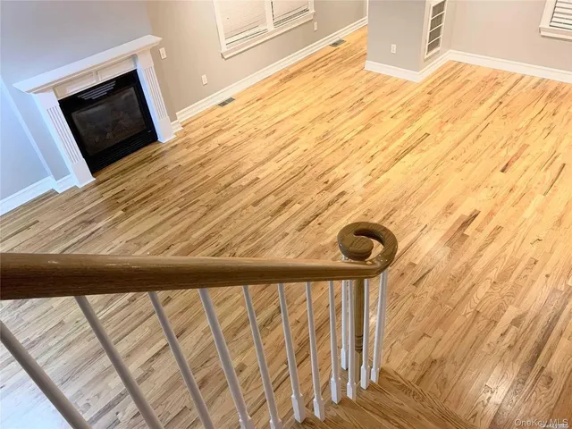 a view of balcony and wooden floor