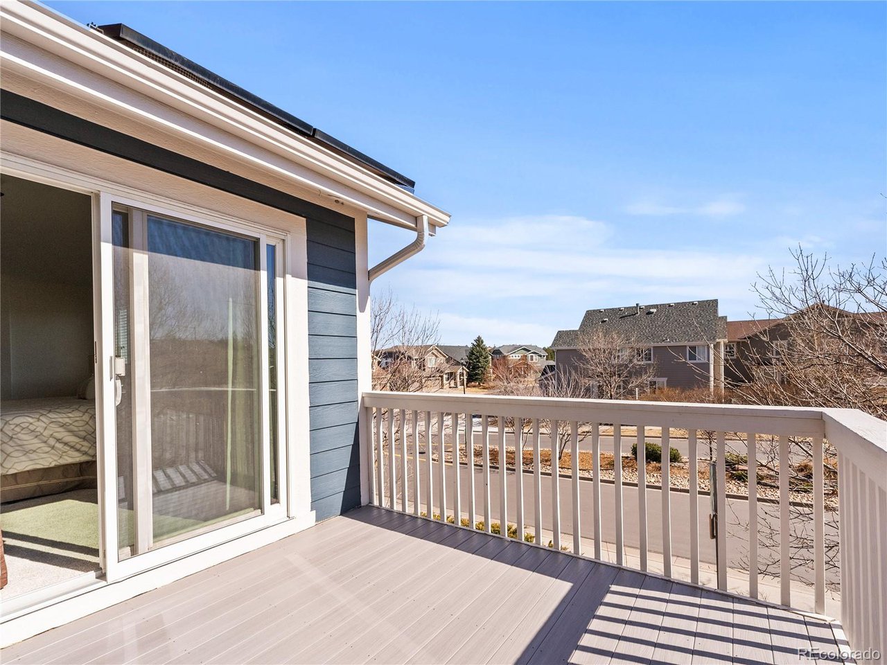 10650 Wagon Box Way Highlands Ranch, CO 80130 - Photo 24 of 47 Primary bedroom private deck