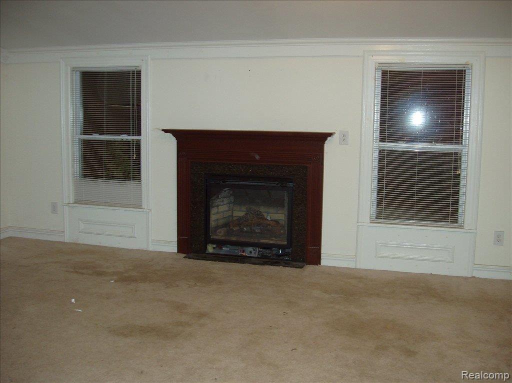 307 Holmes Road Allenton, MI 48002 - Photo 7 of 10 fireplace