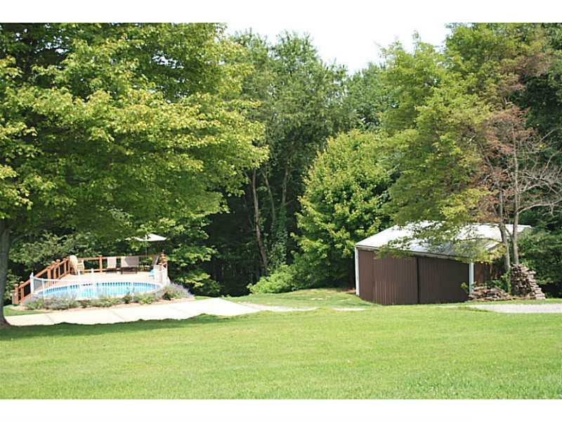 141 Sportsman Lane Rochester, PA 15074 - Photo 20 of 25 Yard/Garden. Newer above ground pool with separate deck! Nicely landscaped too! Large pole building!