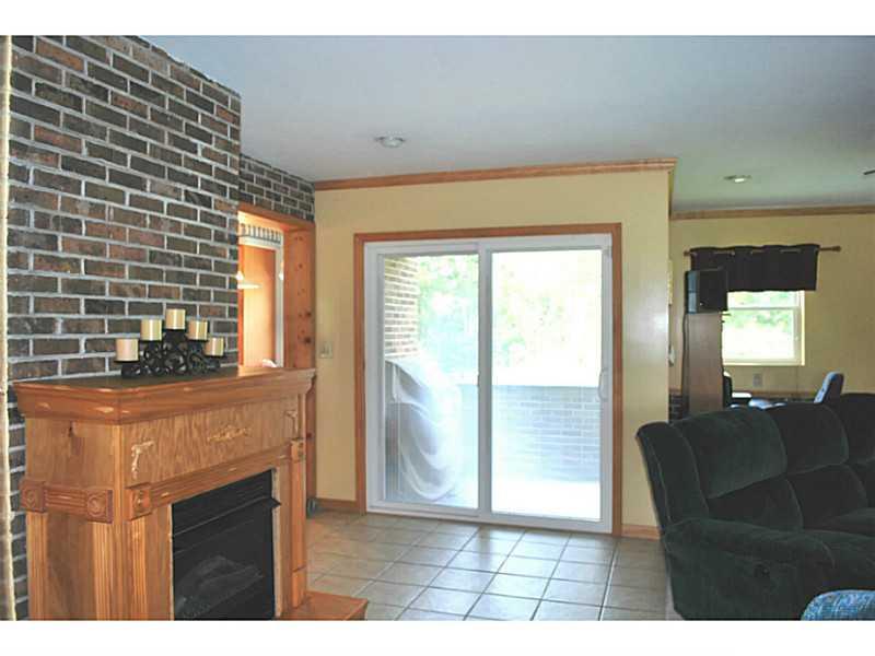 141 Sportsman Lane Rochester, PA 15074 - Photo 5 of 25 Living Room. Covered porch sits between the kitchen and living room areas.