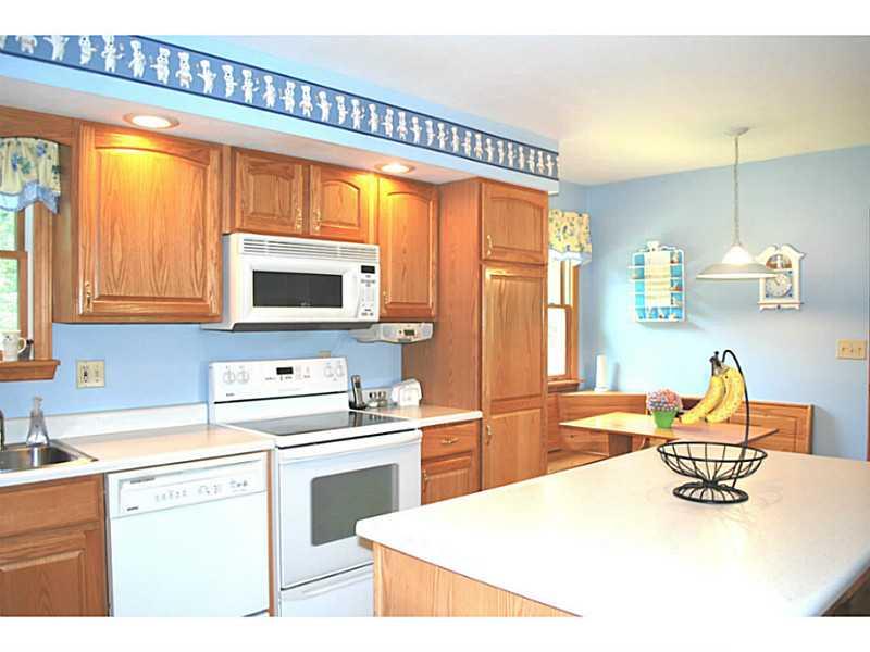 141 Sportsman Lane Rochester, PA 15074 - Photo 7 of 25 Kitchen. Another view of the kitchen showing the separate benched table area.