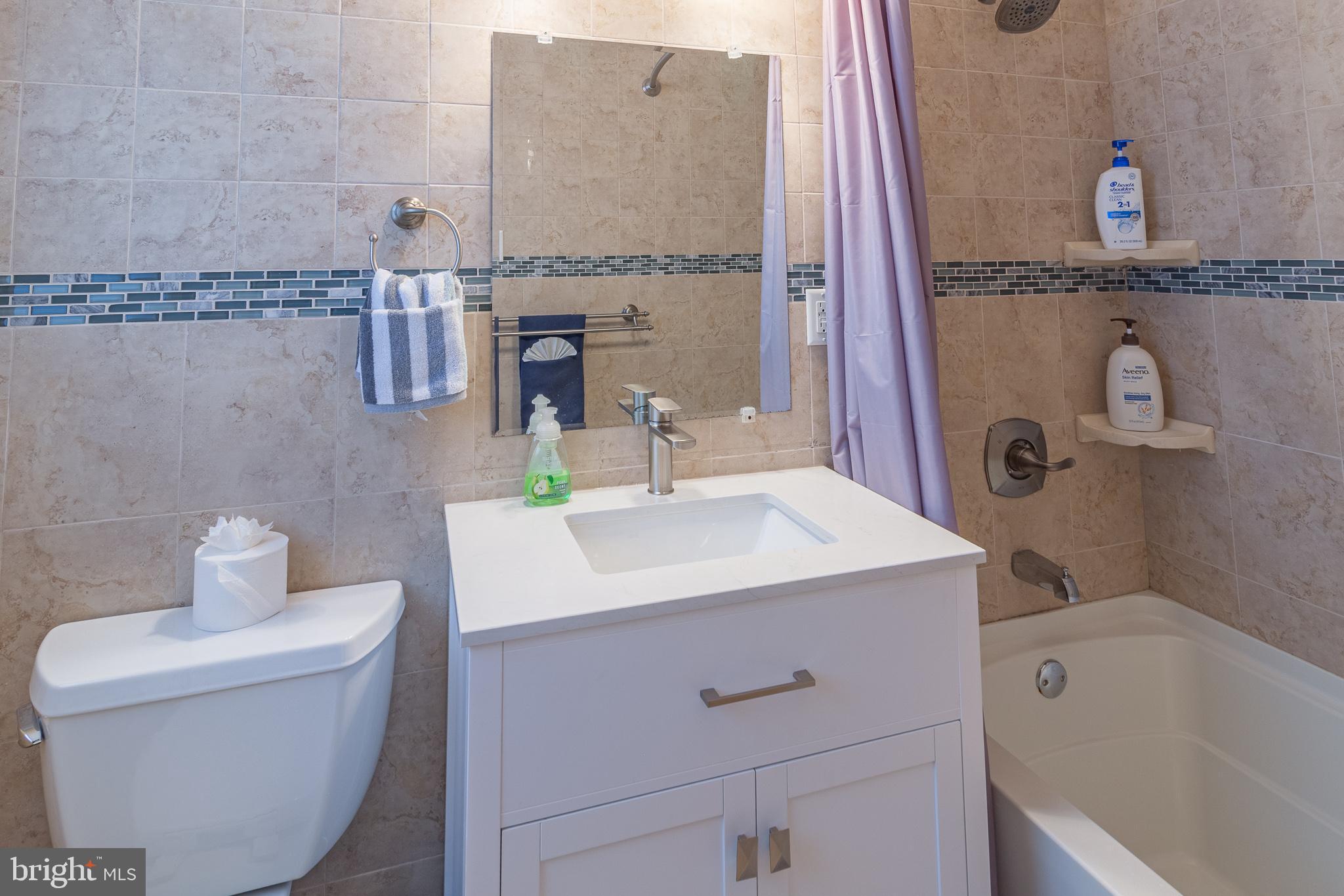 1588 Williams Road Abington, PA 19001 - Photo 20 of 34 a bathroom with a sink and a mirror
