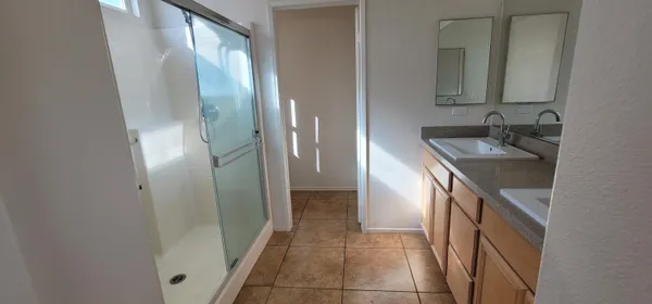 a bathroom with a sink and mirror