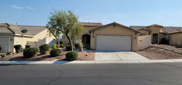 front view of a house with a street