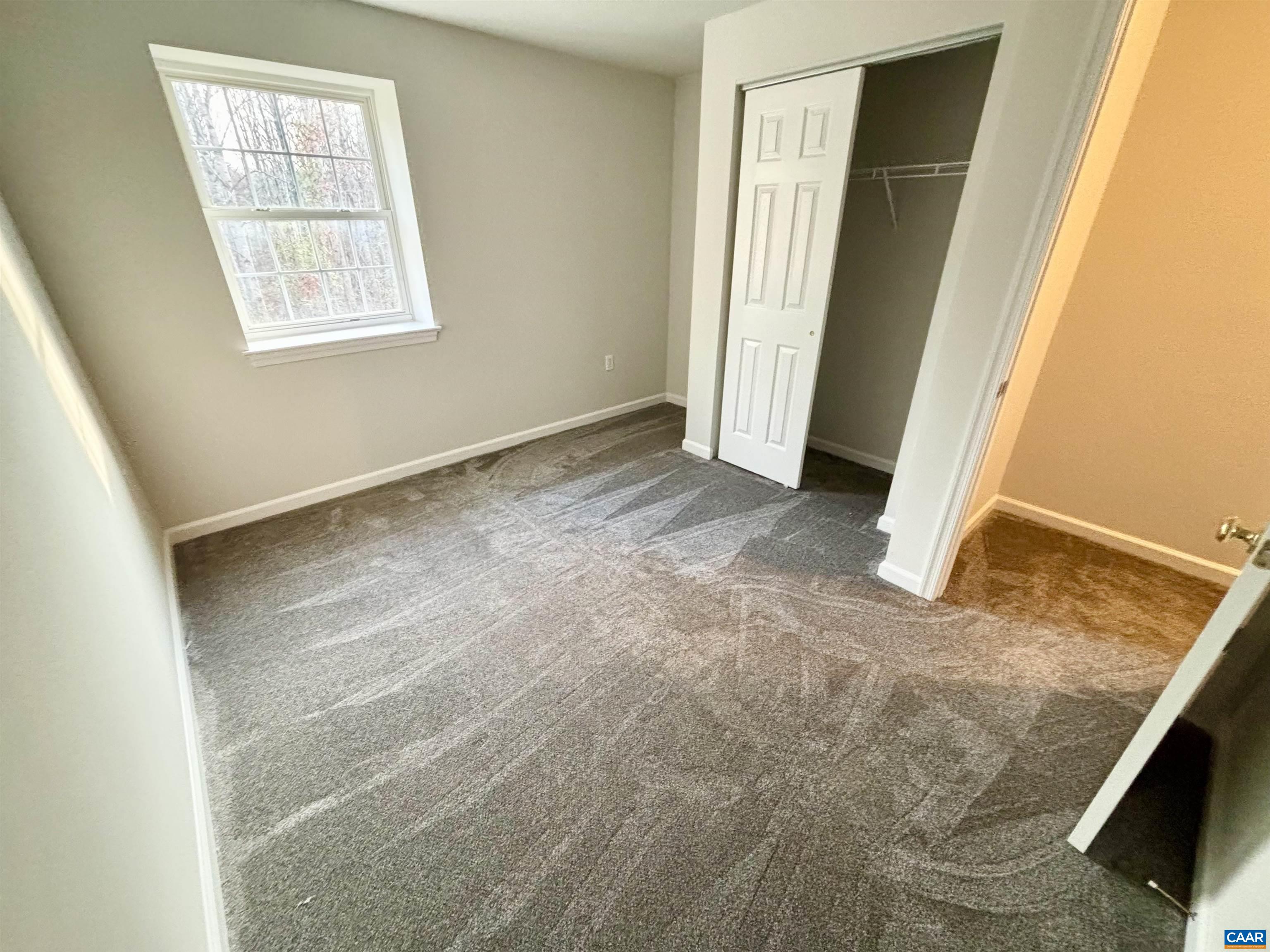 460 Twinkling Springs Road Greenwood, VA 22943 - Photo 12 of 14 an empty room with windows