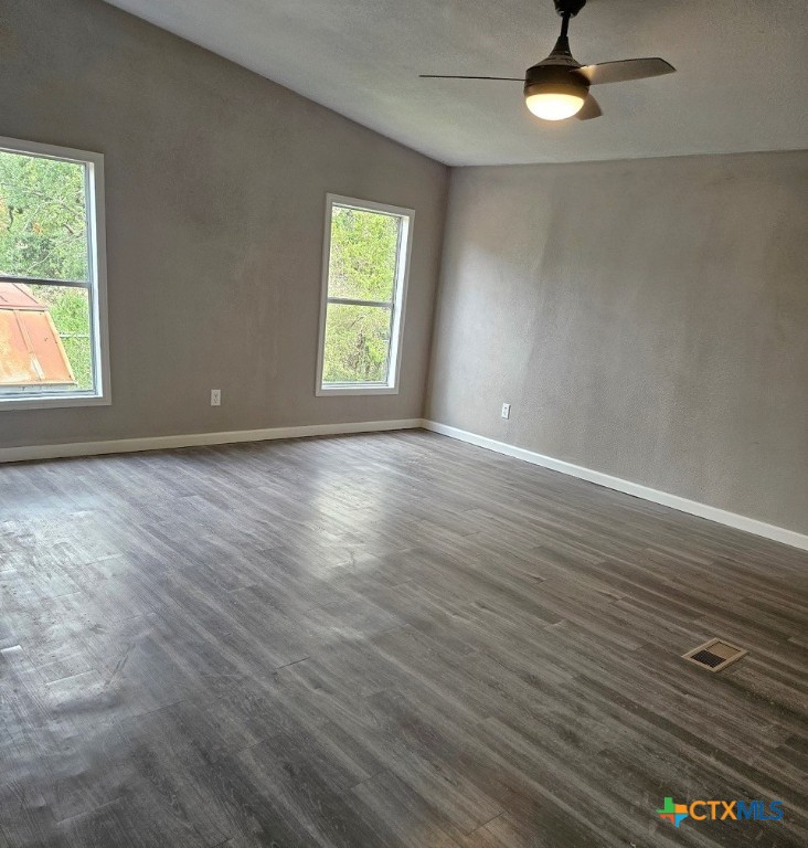 32 Briarwood Road Belton, TX 76513 - Photo 14 of 21 an empty room with wooden floor and windows