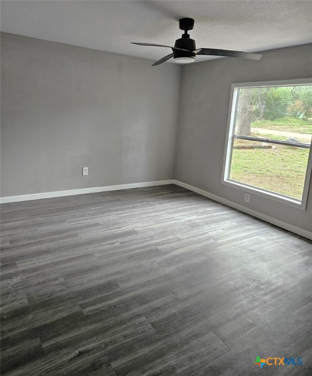 32 Briarwood Road Belton, TX 76513 - Photo 9 of 21 wooden floor in an empty room with a window