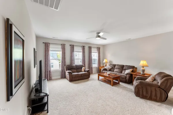 a bathroom with a toilet a sink and a shower