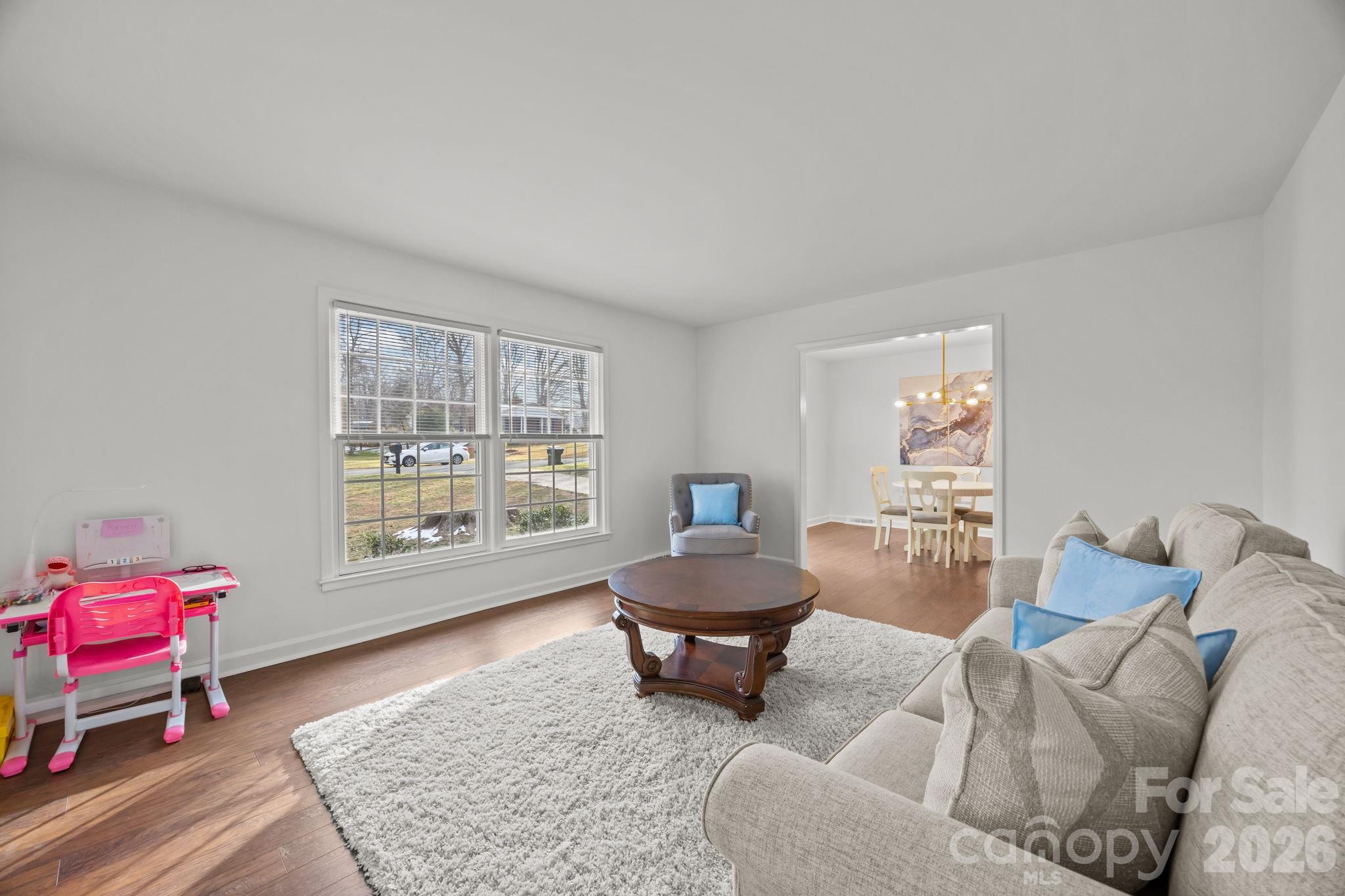 2431 Fox Hollow Road Mint Hill, NC 28227 - Photo 11 of 30 a living room with furniture and a window