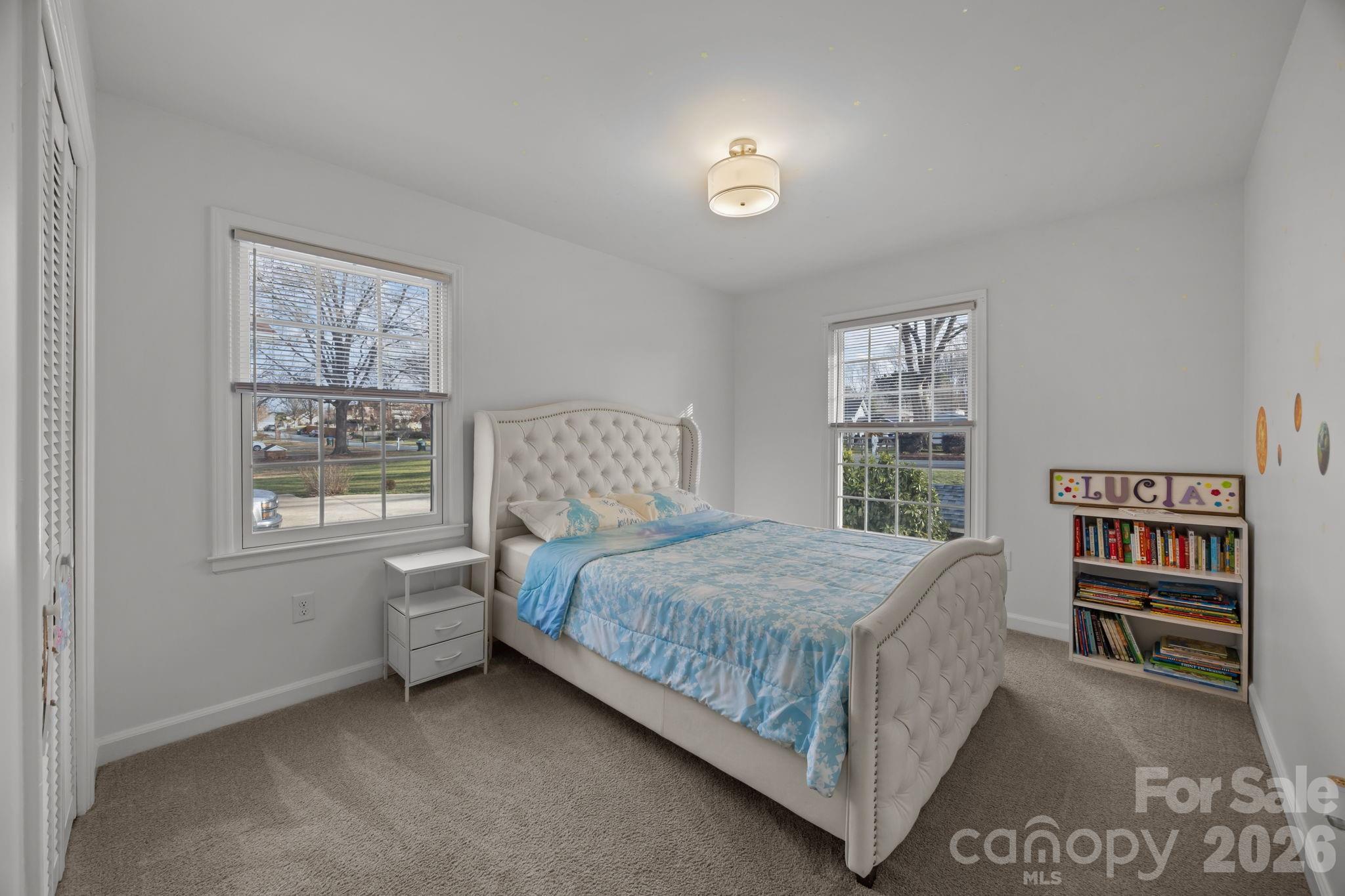 2431 Fox Hollow Road Mint Hill, NC 28227 - Photo 21 of 30 a bedroom with a bed and a window