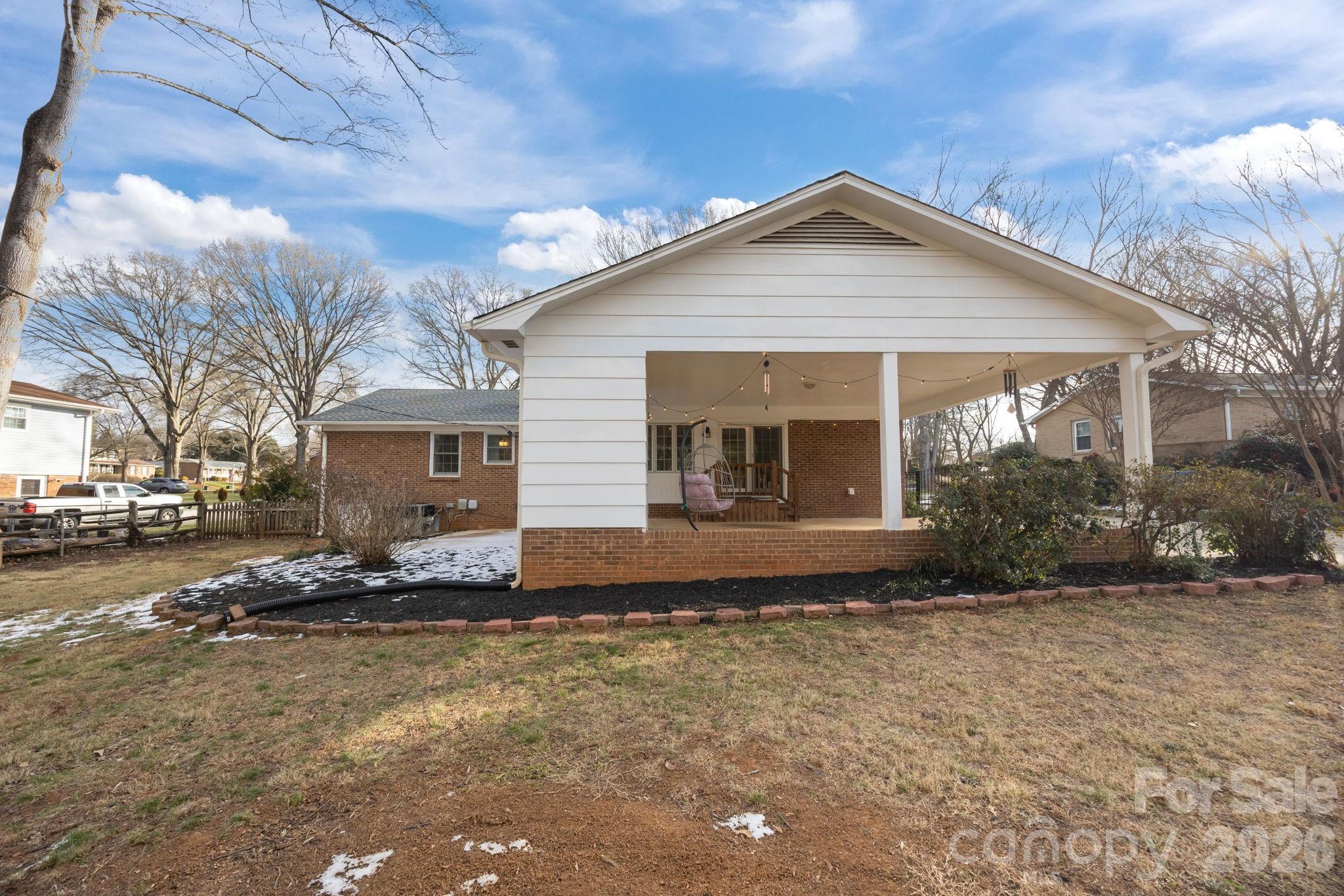 2431 Fox Hollow Road Mint Hill, NC 28227 - Photo 27 of 30 a front view of a house with a yard