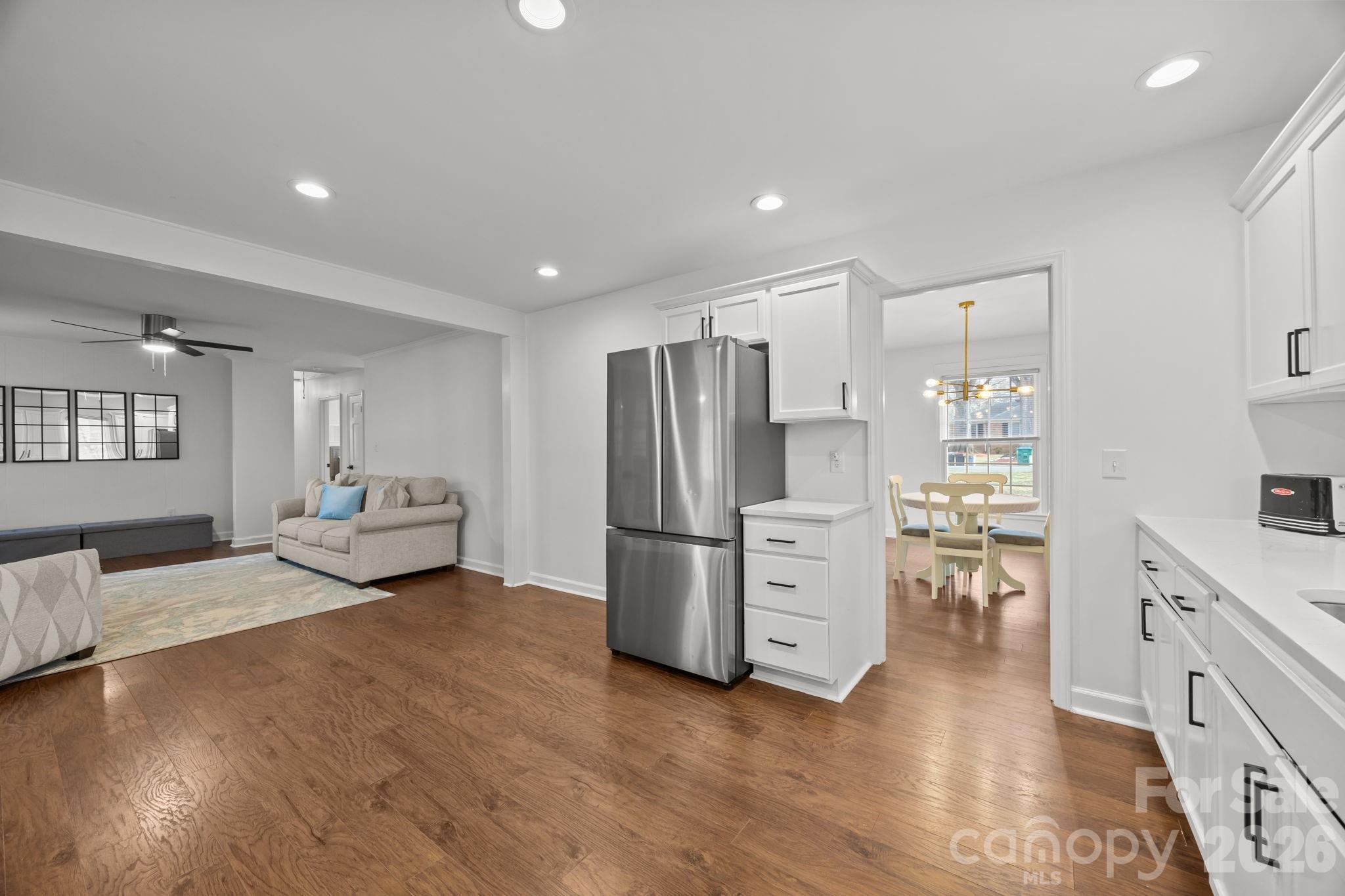 2431 Fox Hollow Road Mint Hill, NC 28227 - Photo 9 of 30 a kitchen with a refrigerator and a stove top oven