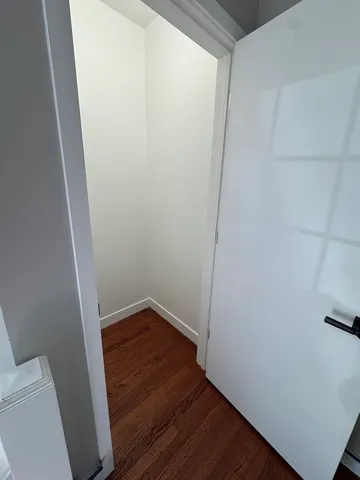 a view of small space with wooden floor