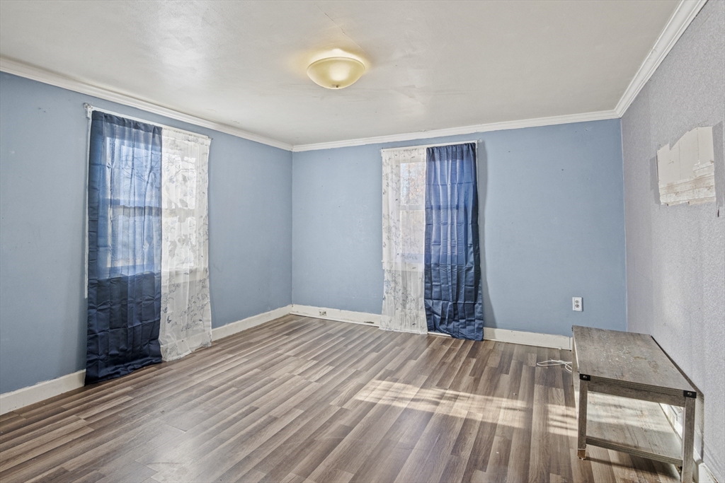 15 White Street Lunenburg, MA 01462 - Photo 11 of 29 a bedroom with a bed and a window