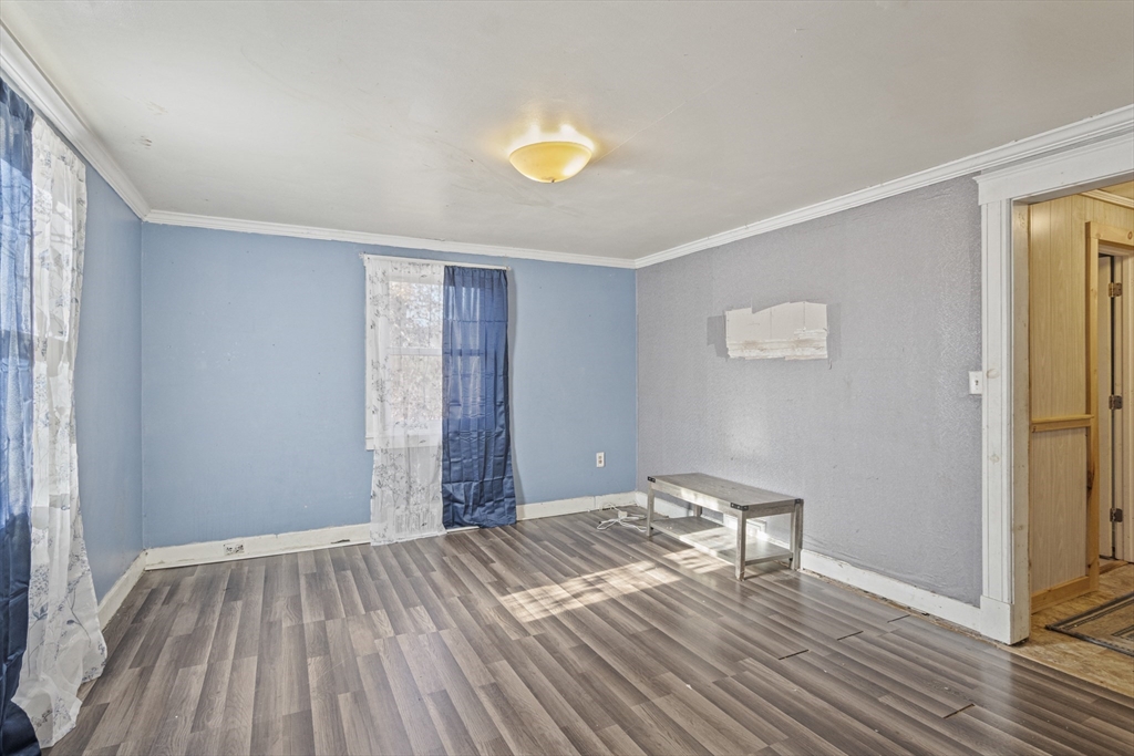 15 White Street Lunenburg, MA 01462 - Photo 12 of 29 a bedroom with a bed and a window