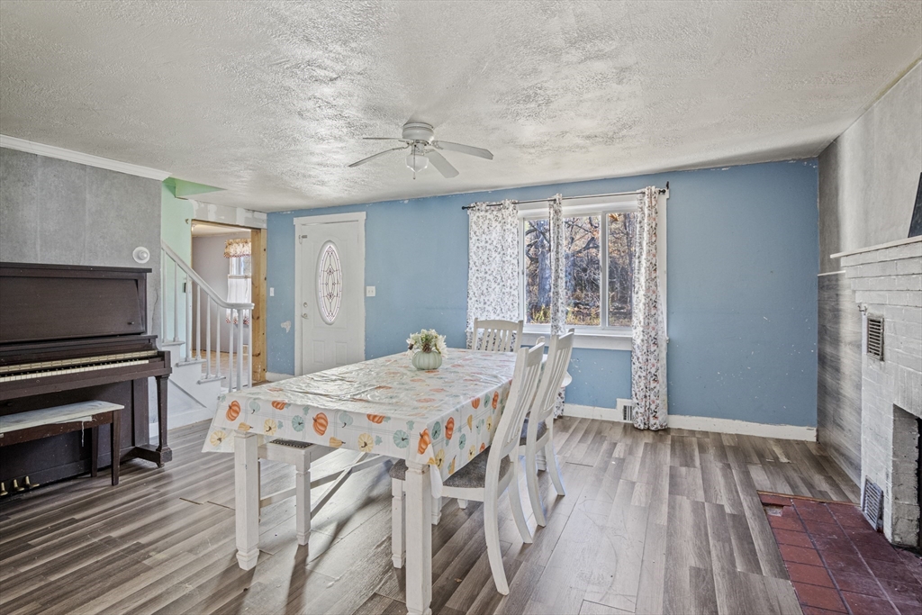 15 White Street Lunenburg, MA 01462 - Photo 19 of 29 a view of a dining room with furniture window and wooden floor
