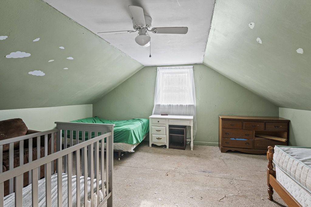 15 White Street Lunenburg, MA 01462 - Photo 21 of 29 a living room with furniture and a fireplace