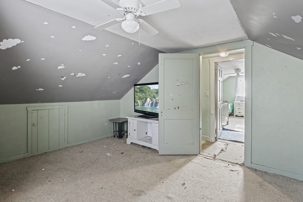 15 White Street Lunenburg, MA 01462 - Photo 24 of 29 en empty room with closet and mirror