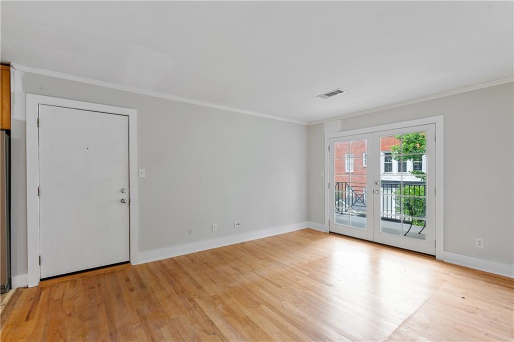 866 Briarcliff Road Northeast, Unit B3 Atlanta, GA 30306 - Photo 3 of 17 a view of an empty room with a window