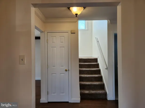 a view of a livingroom with wooden floor