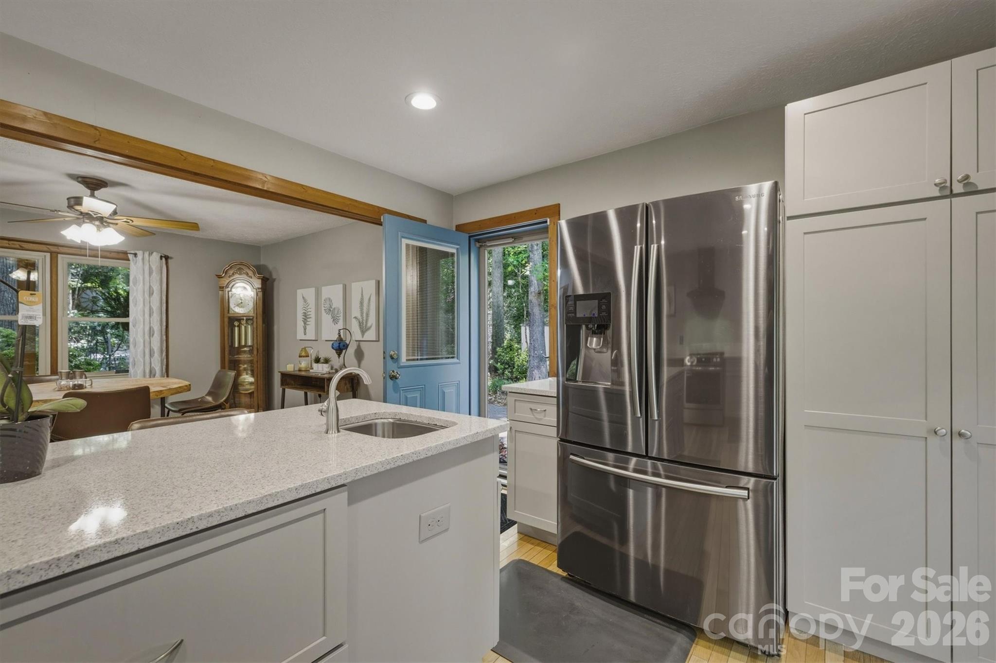 3432 Ridgewood Drive Morganton, NC 28655 - Photo 10 of 36 a kitchen with a refrigerator and a sink