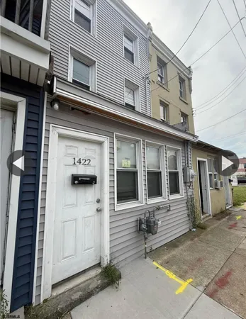 a front view of a house with a garage