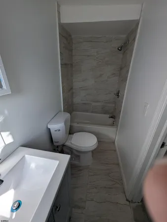 a bathroom with a sink and a toilet