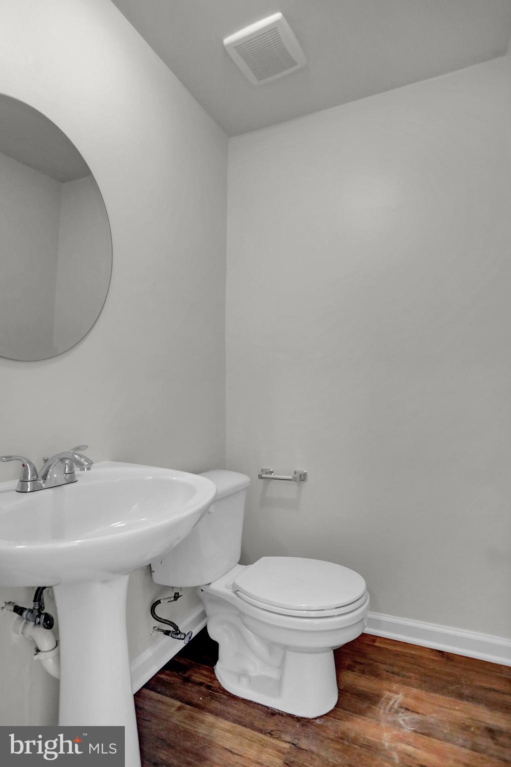 1885 Brookside Drive Edgewood, MD 21040 - Photo 19 of 45 a bathroom with a sink and a toilet