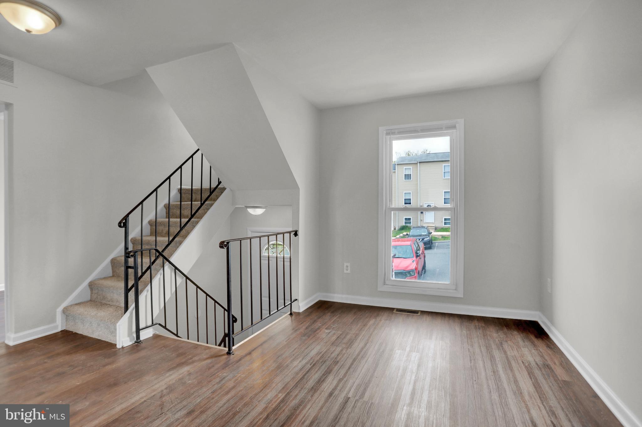 1885 Brookside Drive Edgewood, MD 21040 - Photo 20 of 45 a view of an entryway with wooden floor and door