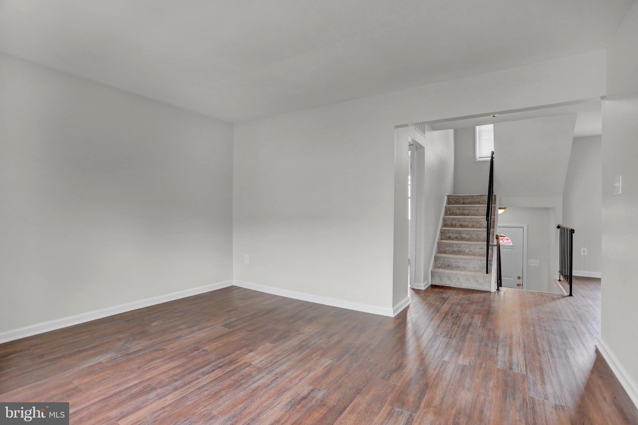 1885 Brookside Drive Edgewood, MD 21040 - Photo 25 of 45 a view of empty room with wooden floor and stairs