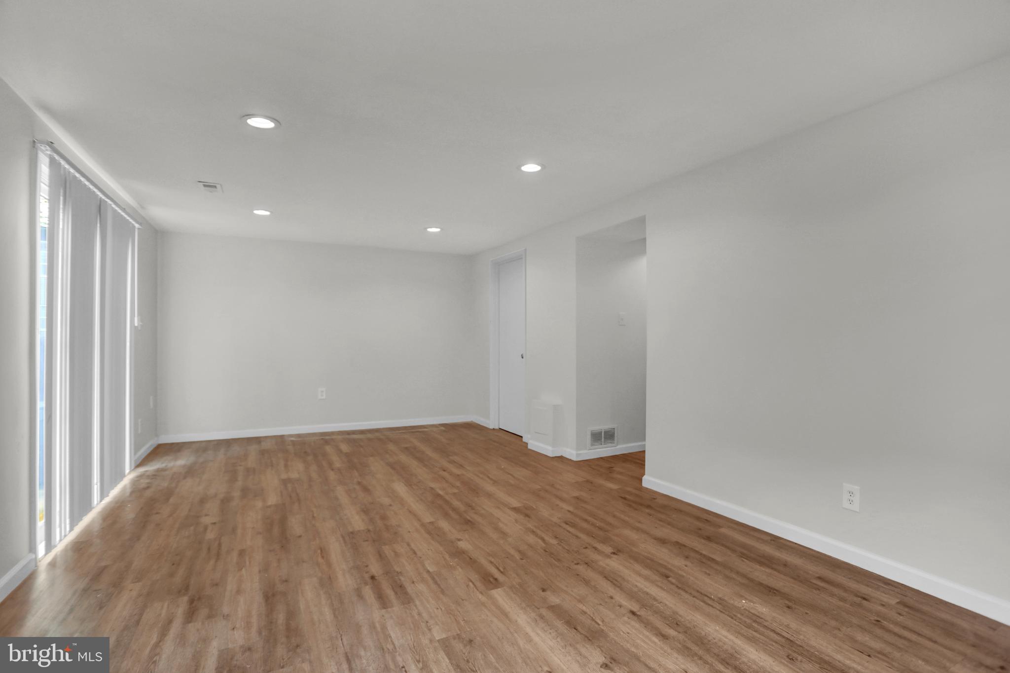 1885 Brookside Drive Edgewood, MD 21040 - Photo 35 of 45 a view of empty room with wooden floor and fan
