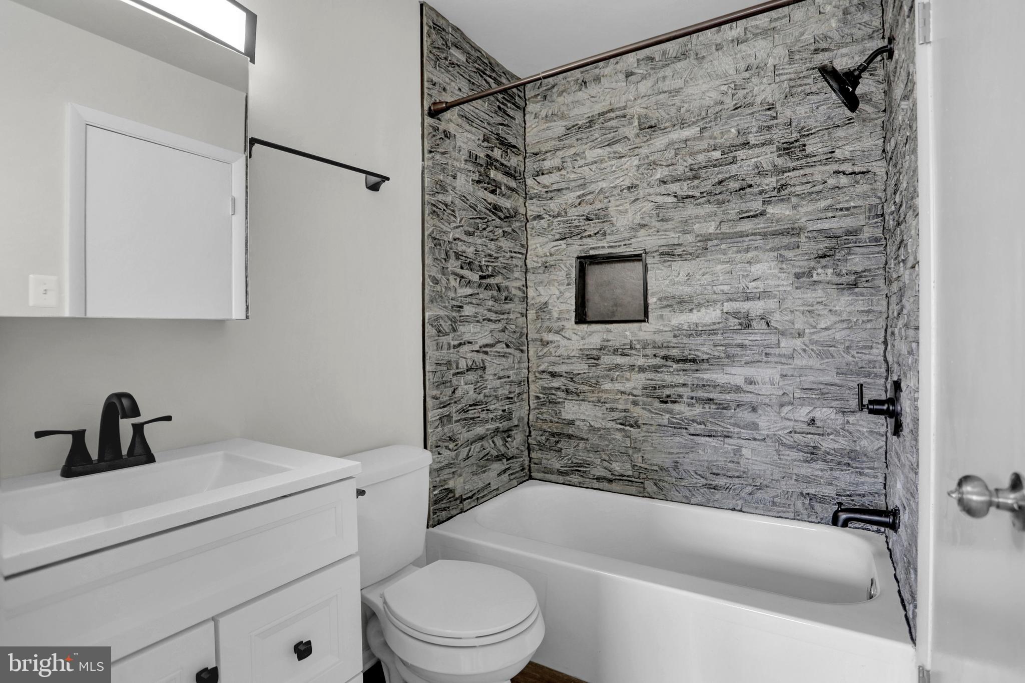 1885 Brookside Drive Edgewood, MD 21040 - Photo 9 of 45 a bathroom with a sink a toilet and bathtub