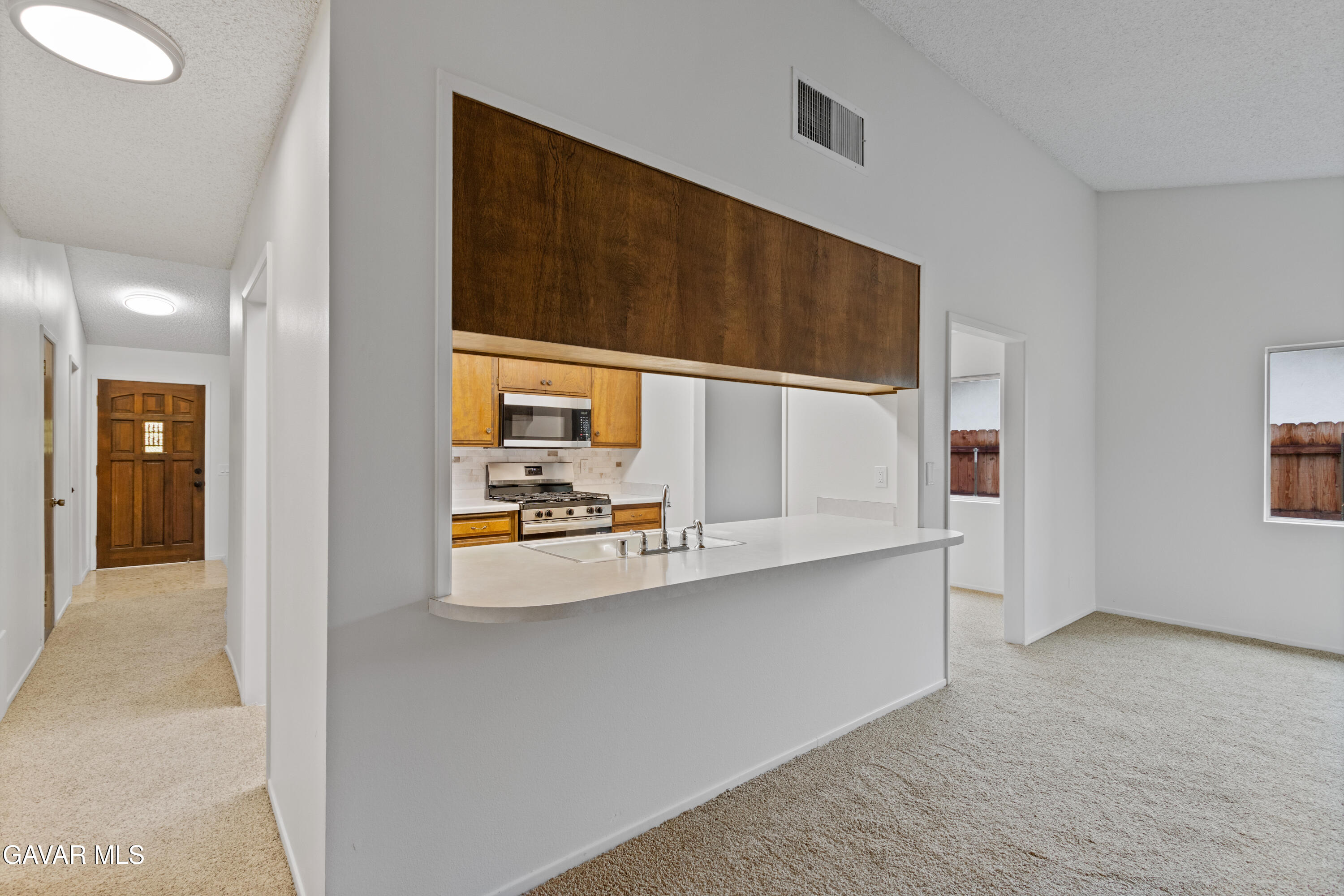 42520 55th Street West Lancaster, CA 93536 - Photo 12 of 21 a view of kitchen with stainless steel appliances cabinets