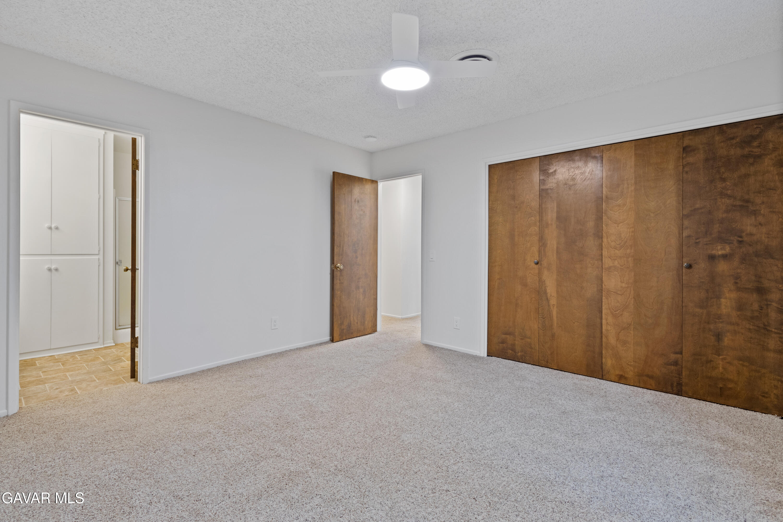 42520 55th Street West Lancaster, CA 93536 - Photo 18 of 21 a view of an empty room and a window
