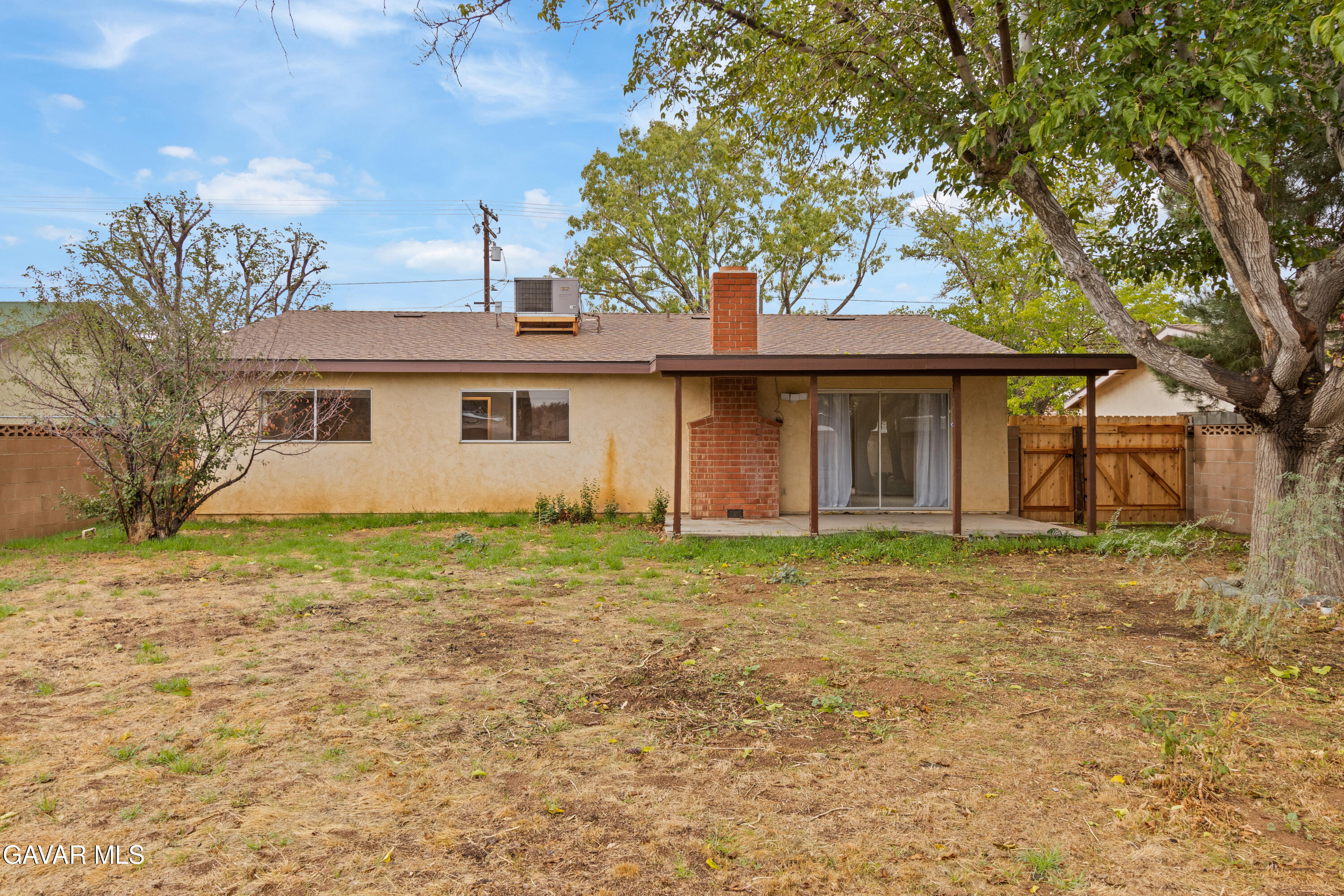 42520 55th Street West Lancaster, CA 93536 - Photo 19 of 21 a view of a house with a yard