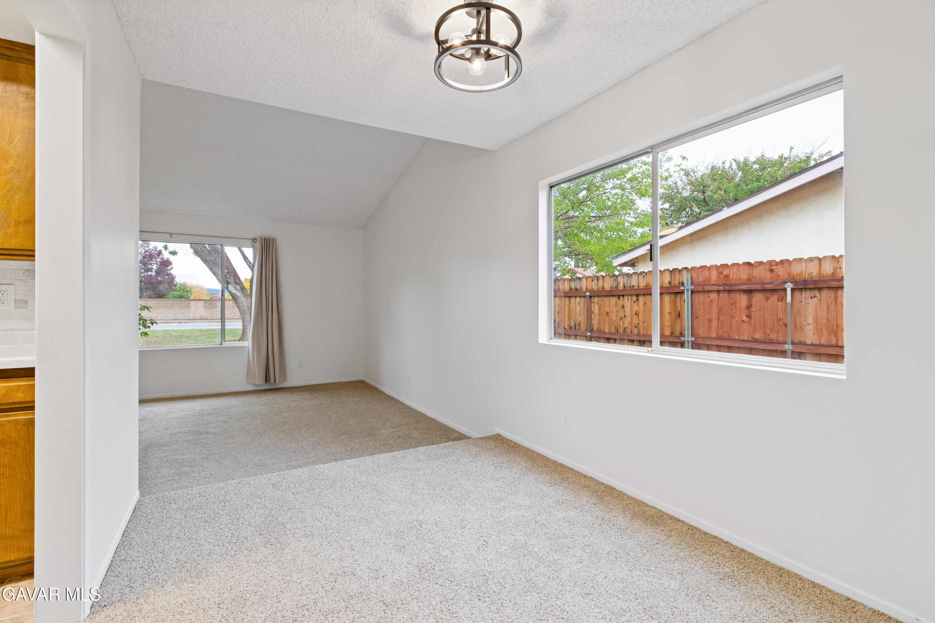42520 55th Street West Lancaster, CA 93536 - Photo 5 of 21 an empty room with a window