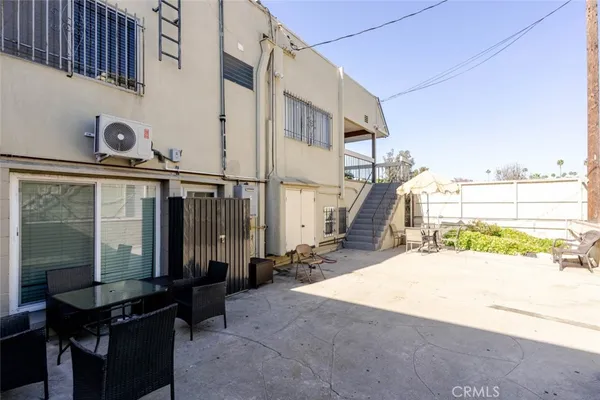 a house view with a outdoor space