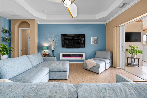 a bathroom with a granite countertop sink a toilet and a mirror