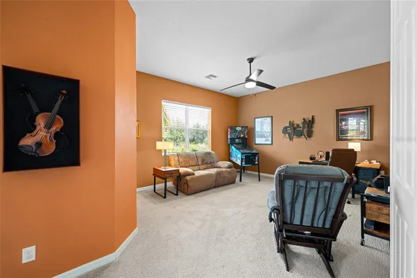 a bed room with a bed and a window