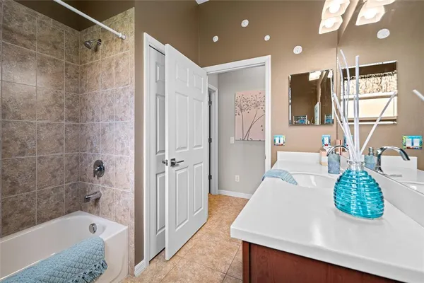 a view of a house with yard and a garden