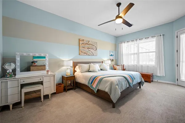 an aerial view of residential houses with city view