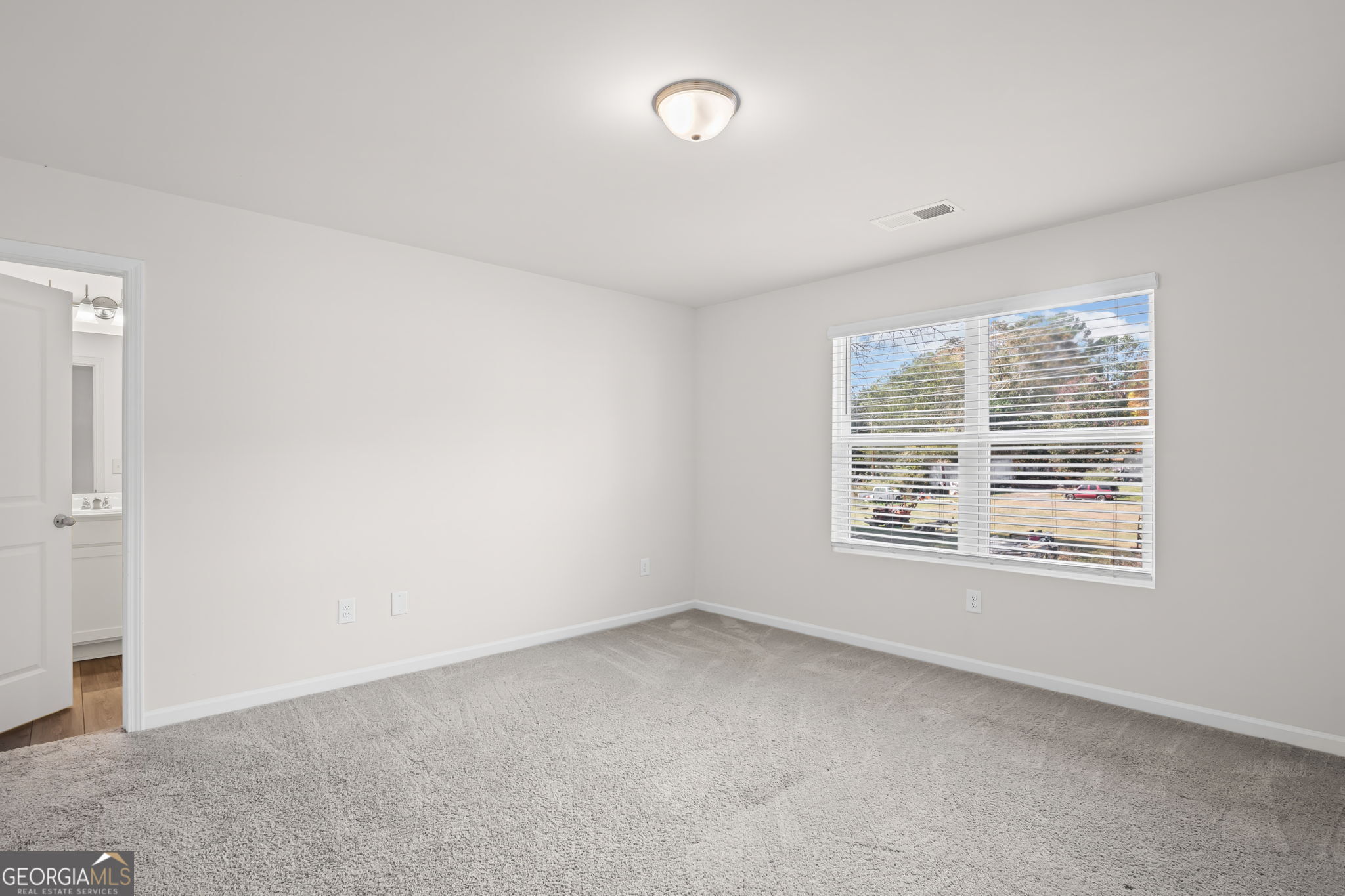 406 Kings Cross Way Cartersville, GA 30120 - Photo 18 of 28 an empty room with a window